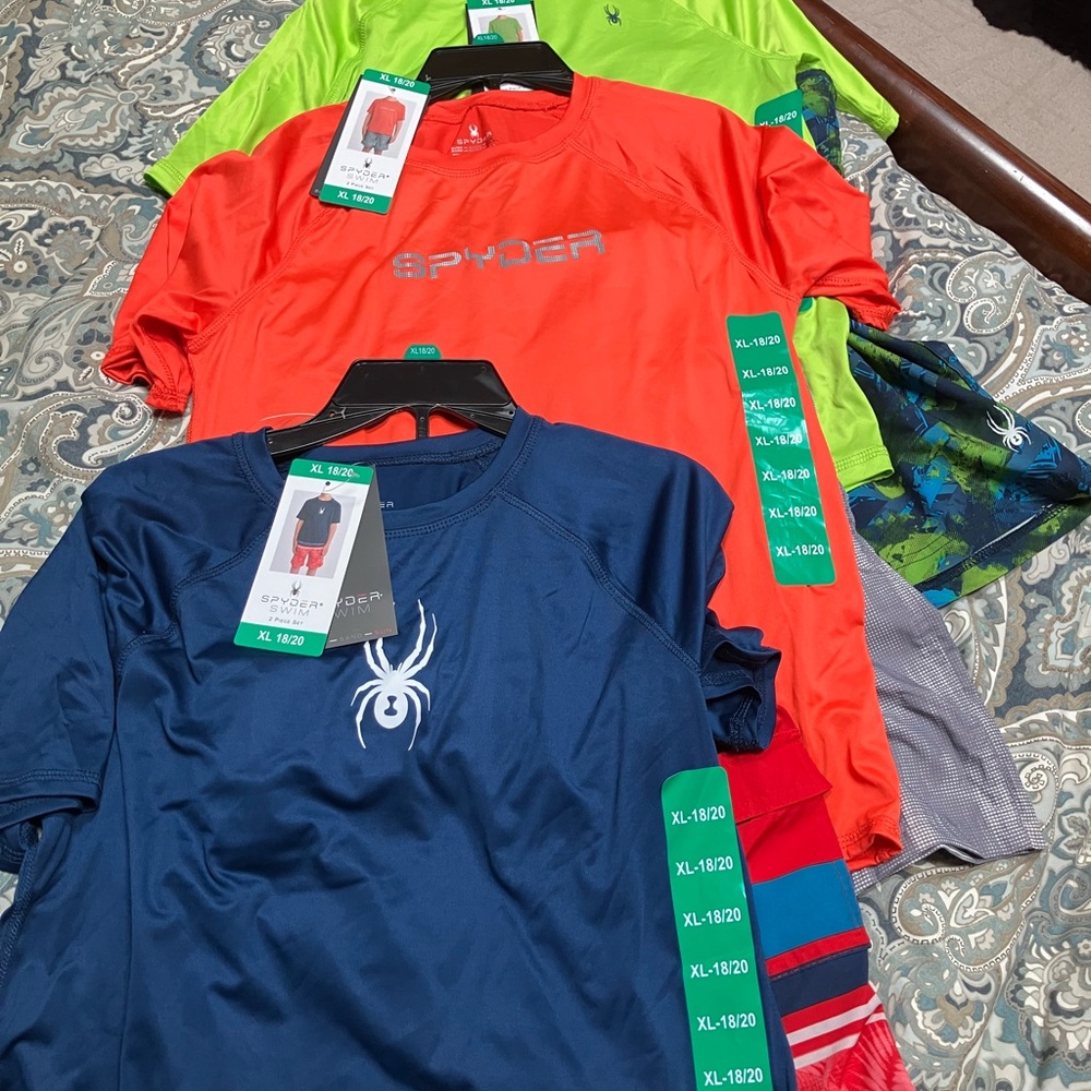 Three Spyder swimsuit and swim shirt. Boys size 18-20.